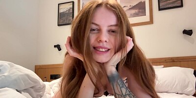 A girl Masturbates on the bed with her fingers and brings herself to Orgasm